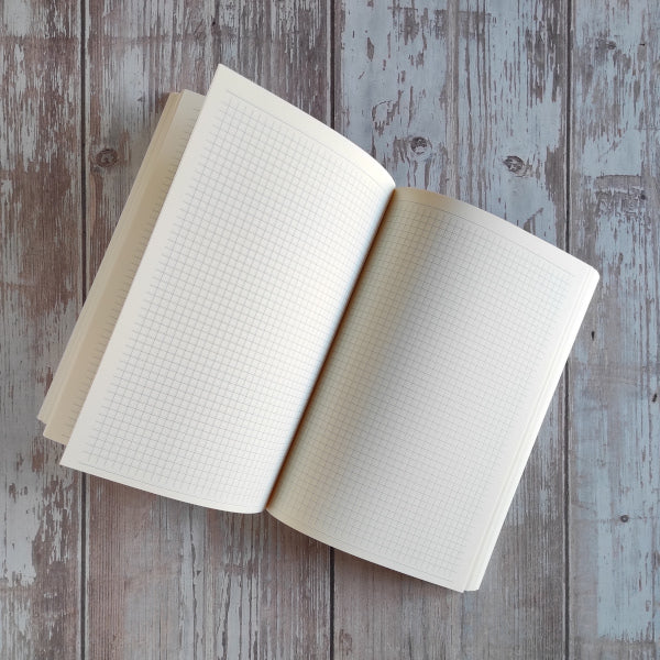 blocco interno per quaderno o diario con 144 pagine a quadretti