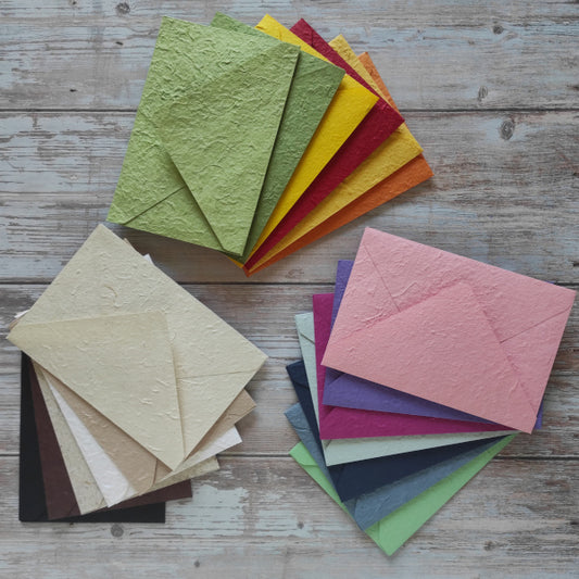 Buste artigianali 12x18 cm in carta di gelso di diversi colori