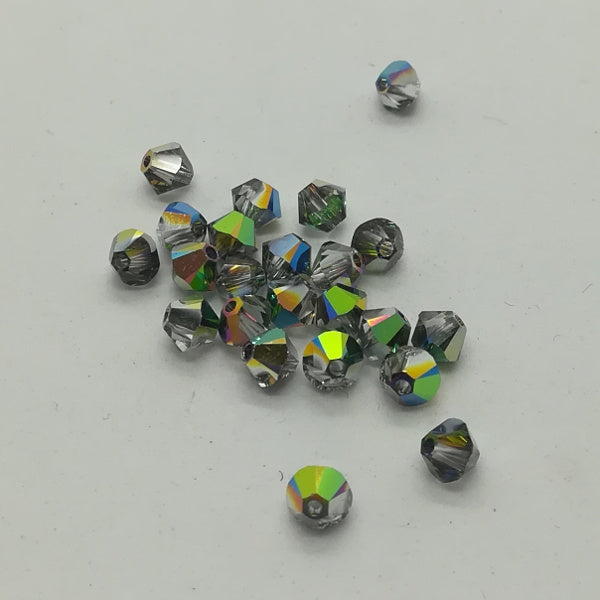 Swarovski - Cristalli bi-cono 4 mm - Cristal Vitrail Medium (10 pz)