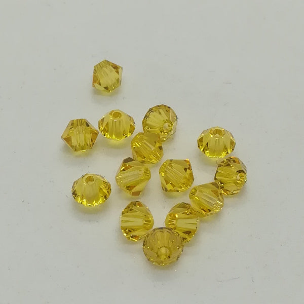 Swarovski bi-cono 4 mm LIGHT TOPAZ