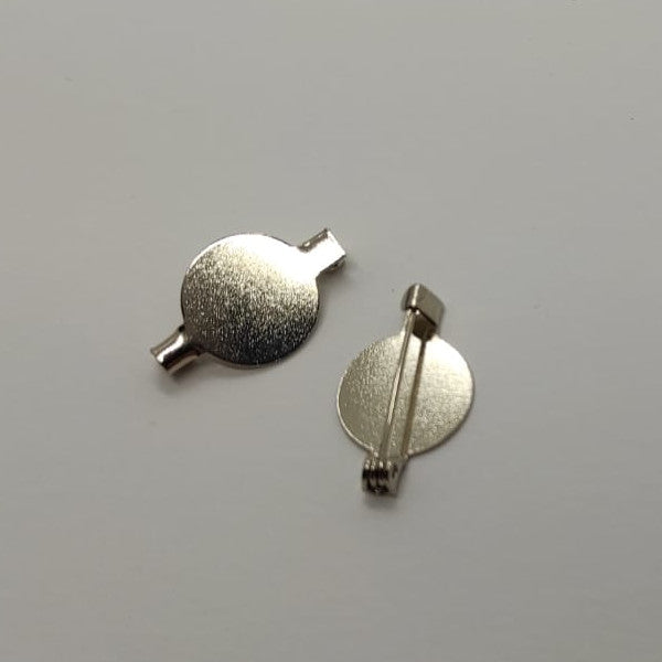 Fermaglio a spilla con placca rotonda diametro 20 mm