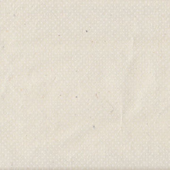 Carta Lokta di produzione artigianale nepalese. Pois bianchi su fondo avorio