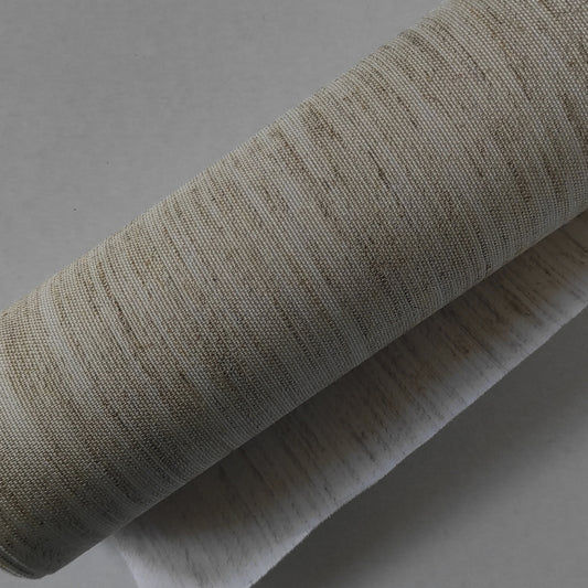 Teletta da legatoria colore lino mélange naturale. Trama fiammata irregolare, tono naturale tra beige e avorio. Aspetto rustico e materico.