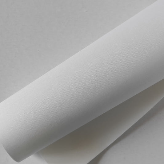 Tela in cotone bianca accoppiata a carta per rilegatura e cartonaggio.