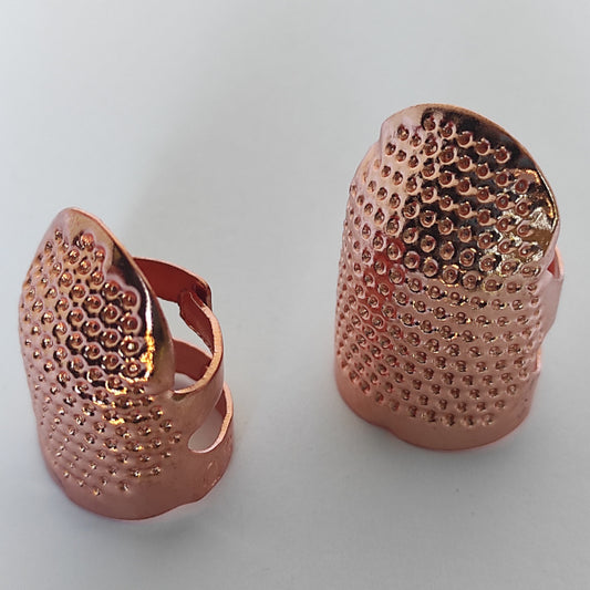 Protezioni regolabili per cucire su materiali rigidi. Set 2 misure. Metallo rosa