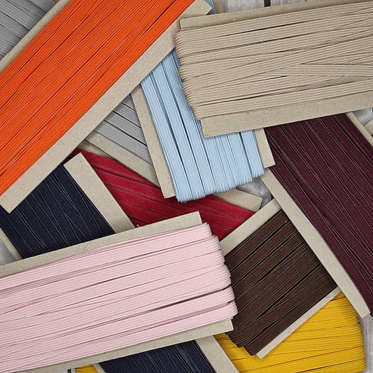 Elastico piatto 6 mm disponibile in diversi e ideale per cucito creativo e legatoria