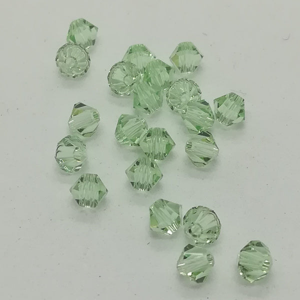 Swarovski - Cristalli bi-cono 4 mm - Chrisolite (10 pz)