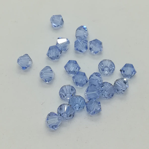 Swarovski - Cristalli bi-cono 4 mm - Light Sapphire (10 pz)
