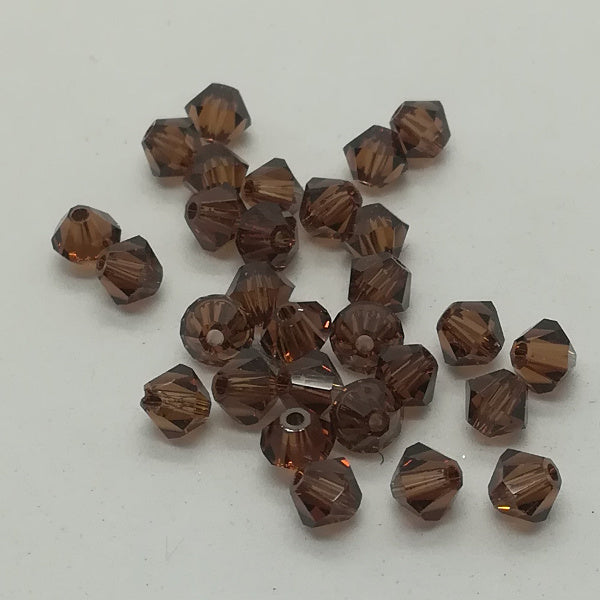 Swarovski bi-cono 4 mm SMOKED TOPAZ