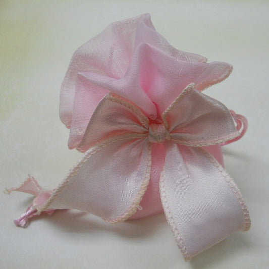 Sacchetto in organza con base a soffietto e fiocco per confezione bomboniere - rosa