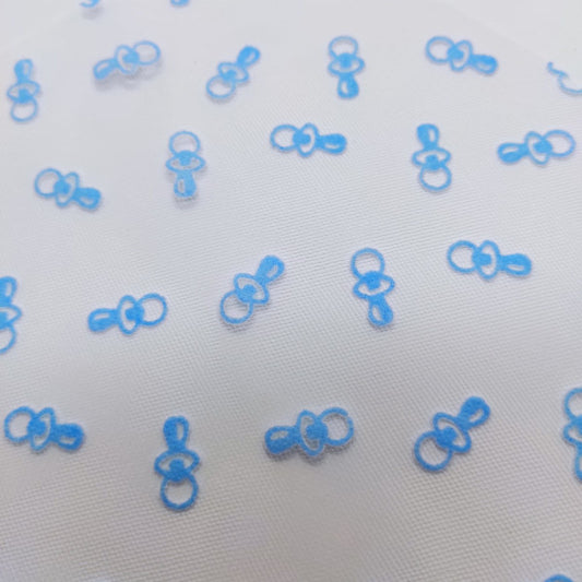Tulle floccato con motivo "ciucci" per bomboniere battesimo - colore azzurro