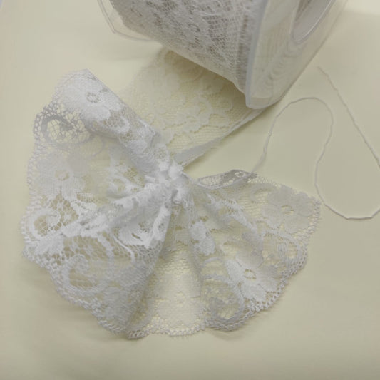 Nastro in pizzo colore bianco con tirante laterale per creare coccarde ideale per decorare bomboniere